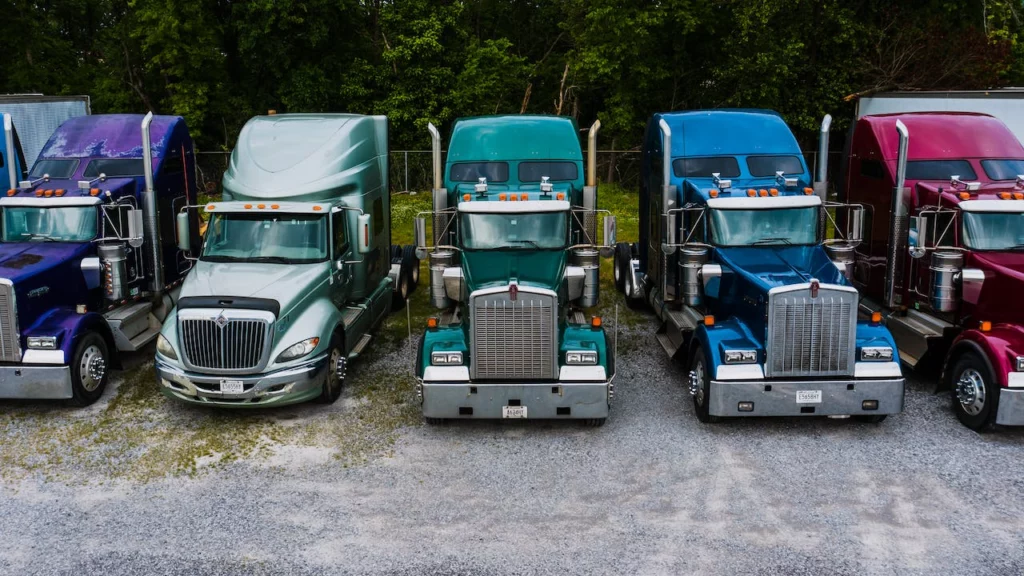 A fleet of trucks parked in a row