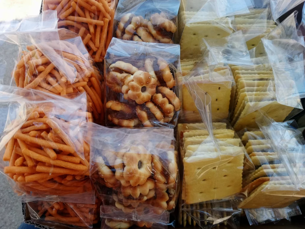 Bags of cookies, crackers, and other snacks
